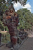 Preah Khan temple - west entrance of the fourth enclosure, the bridge lined by devas and asuras.